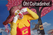 a clown in a red and yellow outfit with the letter g on the bottom