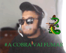 a man wearing sunglasses and a hat is smoking a cigarette next to a cartoon of a snake