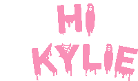 a pink sign that says hi kylie with a spider web