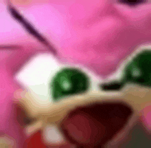 a close up of a pink sonic the hedgehog with green eyes .