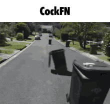 a picture of a trash can on the side of a road with the text cockfn