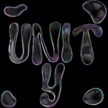 the word unit is made up of bubbles on a black background