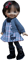 a doll wearing a plaid dress with a cat on the front