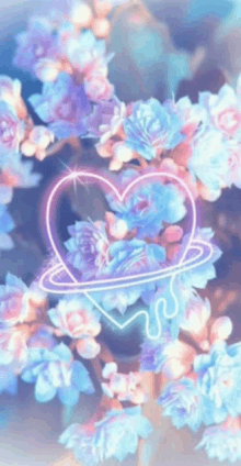 a heart is surrounded by pink and blue flowers on a purple background .