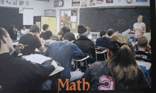 a group of students in a classroom with the word math on the top