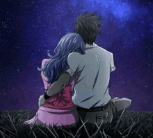 a man and a woman are sitting on the grass under a starry sky .