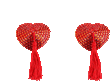 a pair of red heart shaped pasties with red tassels .