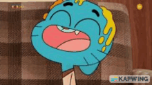 a cartoon character from the amazing world of gumball is sitting on a couch with his mouth open .