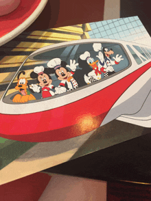 a painting of mickey mouse and his friends on a plane