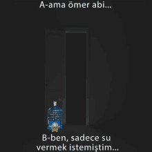 a bottle of water in a dark room with the words a-ama omer abi b-ben sadece su vermek istemistim