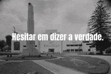 a black and white photo of a building with the words " hesitar em dizer a verdade "