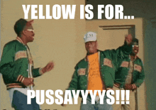 three men in green jackets are standing in front of a door with the words yellow is for pussayyys !!!