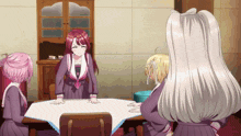 a group of anime girls sit around a table