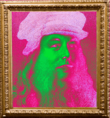 a framed picture of leonardo da vinci has a pink background