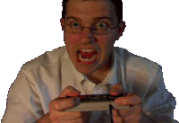 a man with glasses is holding a video game controller with his mouth open