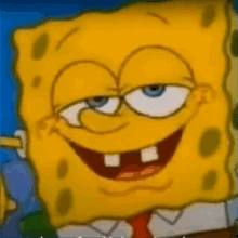 a close up of spongebob squarepants making a funny face with his eyes closed