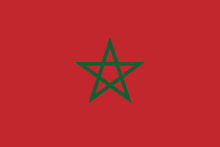 a red background with a green star in the middle