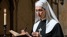 a nun holding a book and a microphone with a cross on her neck