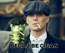 a man in a hat is smoking a cigarette next to a frog that says begaj be cigan