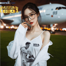 a woman wearing a white shirt that says mixa parlay