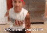 a man is sitting on the floor and saying `` omg ! that car guy !!! ''