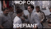 a group of men are standing around a man in a suit with the words hop on xdefiant above him