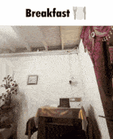 a room with a clock on the wall and the word breakfast on the top