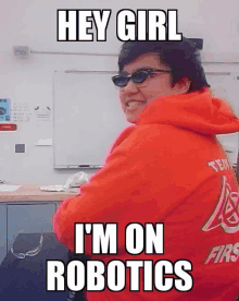 a man wearing sunglasses and a red hoodie with the words hey girl i 'm on robotics on it