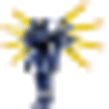 a blurry picture of a blue and yellow object with a white background .