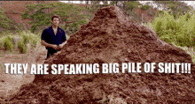 a man standing next to a pile of dirt that says " they are speaking big pile of shit !!! "