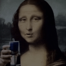 a woman is holding a can of red bull in front of a mona lisa painting