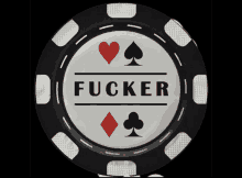 a black and white poker chip with the word fucker on it