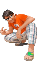 a young man wearing sunglasses and a red shirt with a bird on it is squatting down and giving the middle finger