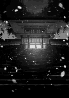 a black and white photo of a staircase leading to a building