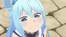 a girl with blue hair is crying with tears running down her face