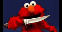 elmo from sesame street is holding a knife in his hands .