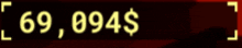 a blurred image of the number 69,094 $ on a red background