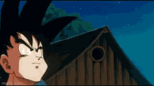 a cartoon character is standing in front of a wooden building looking up at the sky .