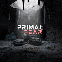 a cave with the words primal fear in red letters