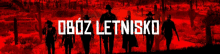 a group of men standing in a field with the words oboz letnisko written in white