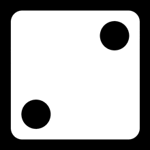 a white dice with two black circles on each side on a black background .