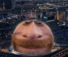 a large sphere with a man 's face on it