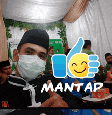 a man wearing a mask is giving a thumbs up and the word mantas is on the bottom right