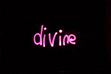 a neon sign that says divine in pink on a black background