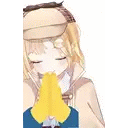 a girl with a hat on is blowing her nose with a yellow object .