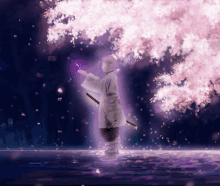 a person standing under a cherry blossom tree