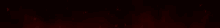 a dark red background with a lot of light coming out of it