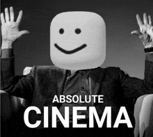 a man with a smiley face on his head is sitting in a chair with absolute cinema written below him