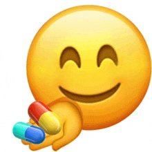 a smiley face is smiling and holding a handful of pills