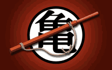 a red and white dragon ball logo with a wooden stick in it